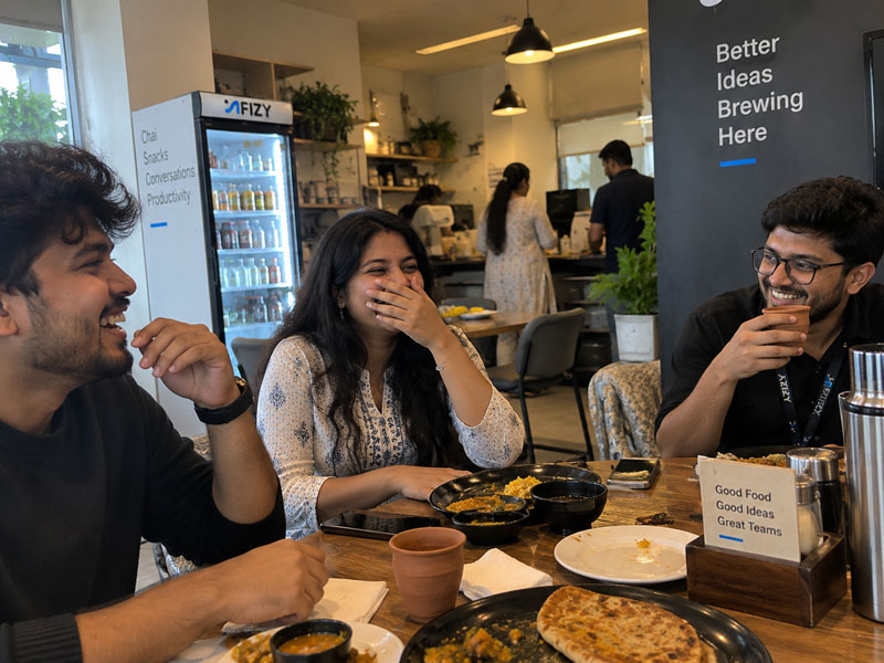Team lunch laughing
